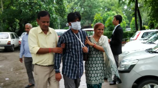 Puneet được dẫn tới tòa tại Delhi sau khi trốn khỏi Úc